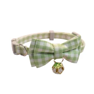 Green white plaid pet collar detail, bowknot design, cute bell, soft fabric, ideal for cat dogs.