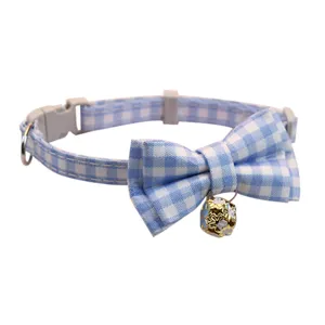 Blue and white checkered pet collar with cute bowknot and golden bell for cats and dogs.