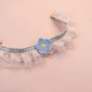 Cute pet lace collar with blue knitted flower and plaid ribbon for cute cats