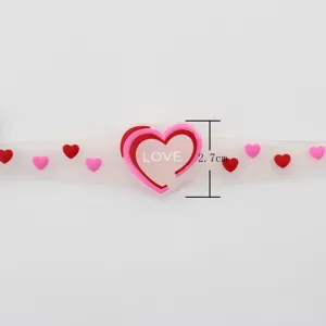 LED luminous pet collar with cute heart charms, translucent pink design, adjustable anti-lost night safety.
