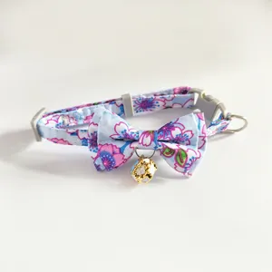 Floral pet collar for cats and dogs, featuring a cute bowknot and a golden hollow bell design.