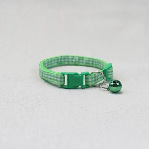 Green plaid pet collar for cats and dogs with a cute jingle bell and secure buckle.