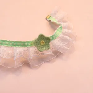 Detailed view of the cute lace pet collar with green crochet flower, perfect for cat and dog.