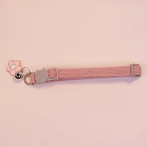 Pink corduroy pet collar with cute cat buckle, bell and flower pendant for cats dogs.