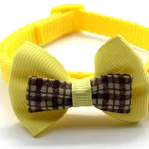 Cute yellow plaid pet bow collar for cats and small dogs, comfortable nylon strap puppy supply.