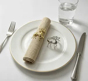 Metal reindeer napkin rings, gold and silver Christmas table decor for dining room.