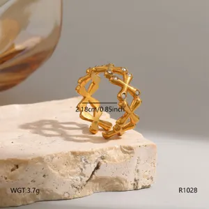 Gold titanium steel cross hollow ring with sparkling crystals, elegant minimalist jewelry.