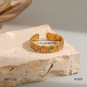 Gold titanium steel crystal open ring detail shot showing texture and size dimensions.