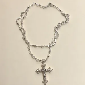 Details of Y2K gothic silver cross pendant beaded necklace, sparkling zircon fashion jewelry.
