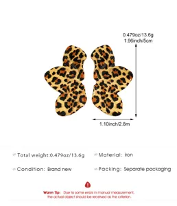 Detailed view of leopard print abstract leaf earrings showing size dimensions and iron material.