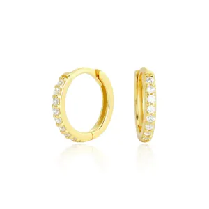 Gold plated sterling silver huggie hoop earrings with sparkling cubic zirconia stones for women.