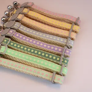 Colorful checkered pet collar with safety buckle and bell, perfect for cats and small dogs.