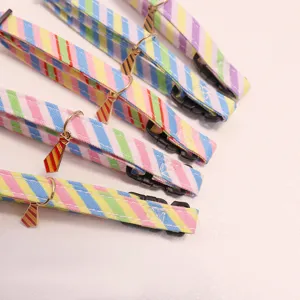 Colorful striped pet collar with cute tie pendant, adjustable cat and small dog neckband detail.