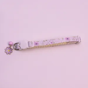 Cute floral cat and dog collar featuring a lovely flower pendant and bell for pets.