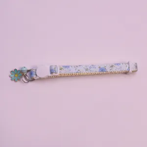Blue floral pet cat collar with cute flower charm and bell, fresh style neck strap detail.