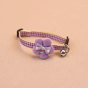 Cute purple plaid pet collar with plush flower, bow and bell for cats and small dogs.