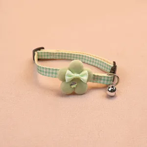 Green plaid pet collar with cute plush flower bow and silver bell, perfect for cats and dogs.