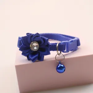 Blue cat collar with rhinestone flower charm and bell for pet cute fashion detail view