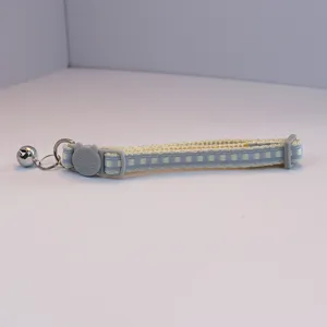 Blue and white checkered pet collar for cats and small dogs with cute cat buckle and bell.