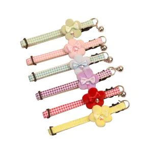 Cute plaid plush flower pet collar with bell, adjustable bow neck strap for cats and small dogs.