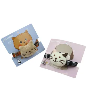 Cute cartoon cat plush pet collar with bell, adjustable strap for dogs and cats, main view.