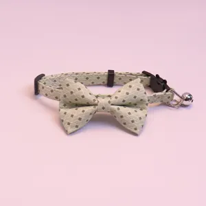 Green plaid pet collar with cute bow tie and bell, adjustable cat and small dog neck strap.