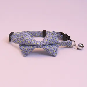 Cute pet collar with bow tie and bell, geometric plaid pattern design, adjustable size.