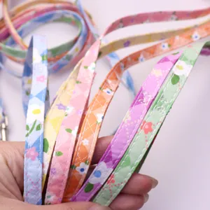 Colorful floral pet leash and collar set, durable fabric webbing design for small dogs and cats.
