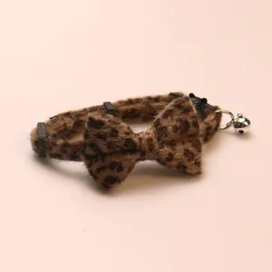 Fluffy leopard print pet collar with cute bowknot and bell, stylish cat and dog accessory.