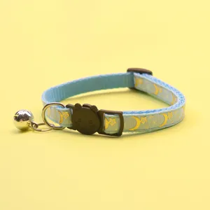 Blue pet cat collar with gold moon star print, cute cat buckle and metal bell for small pets.