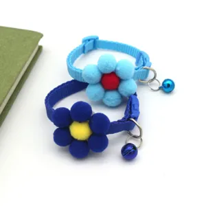 Pet collar main view featuring cute plush flower design and bell for small dogs and cats.