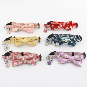 Floral bow pet collar with bell, cute cat and dog neck accessories for daily wear.