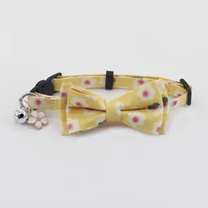 Cute yellow floral pet collar with bow tie, bell and flower charm for cats and small dogs detail