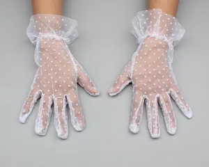 Women short white lace mesh polka dot gloves ruffles bridal wedding dress accessory details.