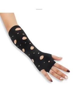 Close-up detail of gothic punk black distressed fingerless gloves, arm sleeve with cutout.