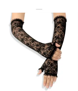 Detail shot of elegant black lace fingerless gloves, sheer floral mesh sun protection.