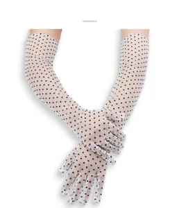 Detail view of women vintage long mesh polka dot gloves elegant bridal lace accessories.