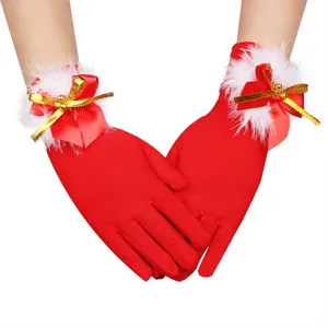 Red Christmas gloves with white faux fur trim, perfect festive holiday accessories.