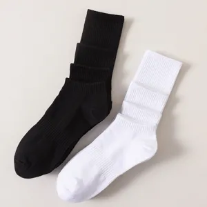 Classic black and white crew socks set, breathable cotton daily athletic socks for men and women.