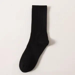 Black ribbed mid-tube sock detail view showing close-up fabric texture and classic design.