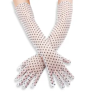 Vintage long polka dot mesh gloves for women, sheer lace bridal wedding sun protection accessory.