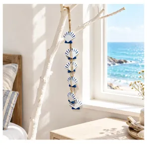 Mediterranean coastal seashell wall hanging decor detail scene with blue and white accents.