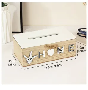 Close-up detail of the rustic wooden tissue box showing the decorative lettering and texture.