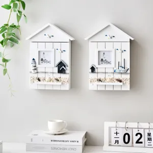 Mediterranean wooden house key box wall hanging with ocean elements for home decor and storage.