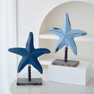 Conjunto de decoración de mesa de estrella de mar de madera estilo mediterráneo azul.