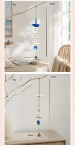 Mediterranean style wind chime pendant with sailboat and starfish, perfect for home decor.
