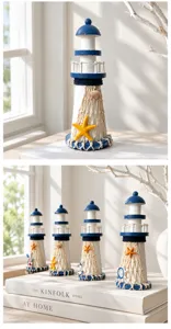 Close-up of Mediterranean wooden lighthouse with blue-white finish and starfish decor.