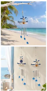 Mediterranean wooden sailboat wind chime with blue star pendants for home room decor.