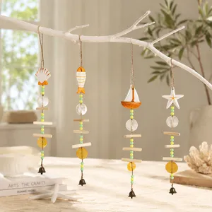 Mediterranean colorful wind chime hanging ornament with ocean theme, shell and sailboat.