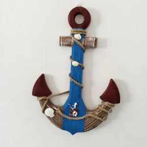 Mediterranean wooden anchor wall decor, vintage nautical hanging ornament with shells and ropes.